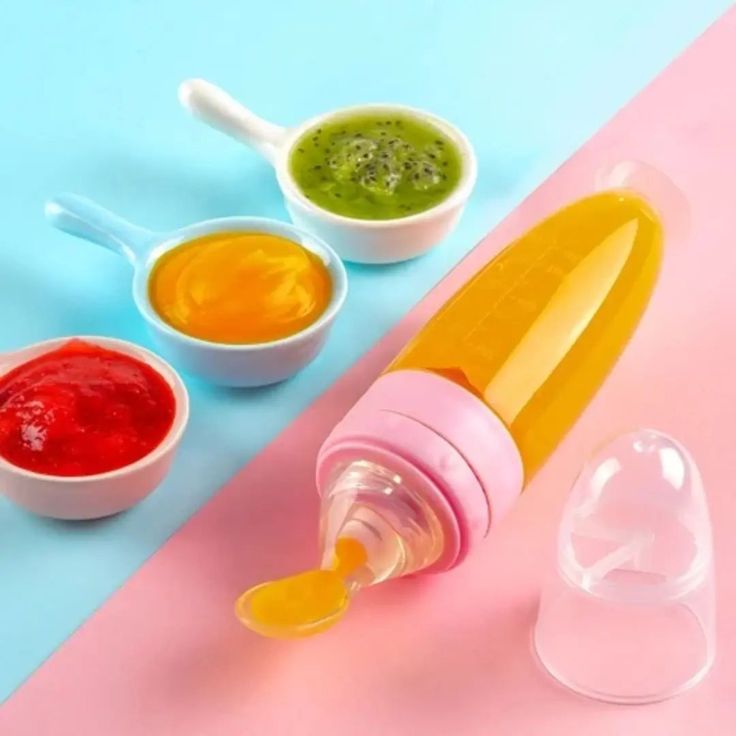 Zovio™ 2 - in - 1 Silicone Baby Squeeze Feeding Spoon & Bottle - Zovio